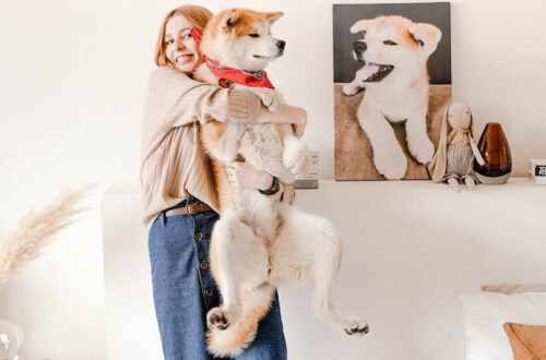 woman carrying her dog