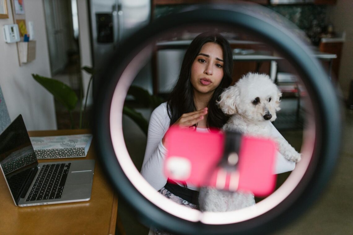 a woman holding her dog